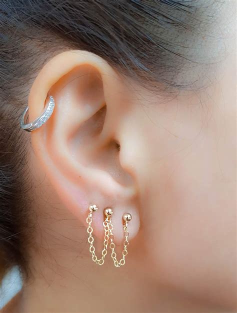 Ear Piercings, Jewelry & Toys .